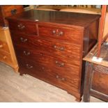 A George III mahogany chest of drawers, crossbanded to the top, standing on ogee bracket feet,