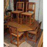 Robert 'Mouseman' Thompson of Kilburn adzed oak dining table and six chairs, the table having an