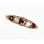 An antique diamond, ruby and garnet ring, scroll setting, hallmarked 18ct gold band, spnsor's mark