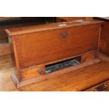 A late Victorian inlaid oak desk tidy with letter rack and ceramic ink wells, Arts & Crafts style