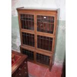 An early 20th century leaded glass oak bookcase, width 89cm, depth 30cm & height 149cm.