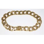 A curb link bracelet, length 21cm, marked '14K', wt. 34.05g. Condition - good, general wear only.