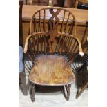 An 19th century elm and yew wood Windsor chair, height 92cm, width 55.5cm and depth 58.5cm. Some