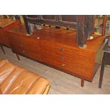 A mid 20th century teak sideboard with leather handles by Beithcraft, length 181cm.