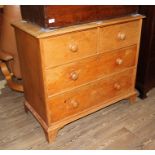 A 19th century pine chest of drawers, standing on bracket feet, height 85.5cm, width 96.5cm and