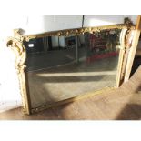 A 19th century gilt swept mirror, 135cm x 84cm.