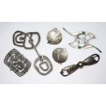 Modernist silver brooches comprising an abstract brooch by Ola M Gorie, a pair of MacIntosh style