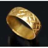 A 22ct gold wedding band, sponsor's mark 'S&W', London 1969, wt. 6.29g, size Q.