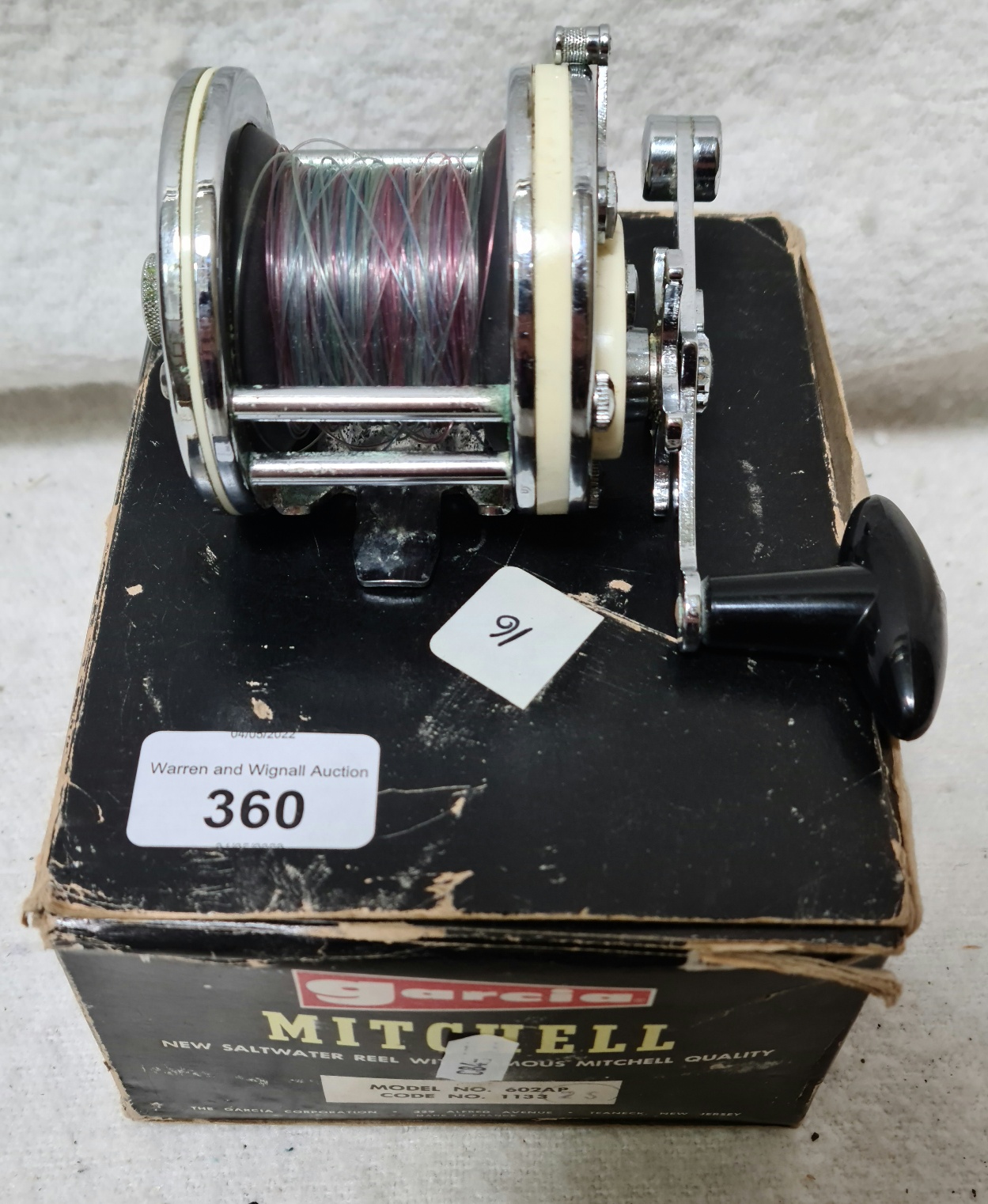 A Mitchell 602AP fishing reel in box