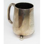 A late Victorian hallmarked silver tankard, wt. 119.1g, as found.