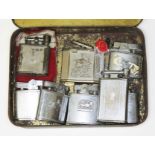 A tin of assorted vintage lighters including Polo, Bride, Willow, Ronson etc.