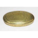 A Dutch brass tobacco box of oval form, length 13.5cm.