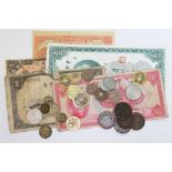 A collection of Chinese and Hong Kong coins and banknotes.