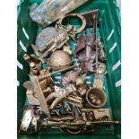 A crate of various brassware