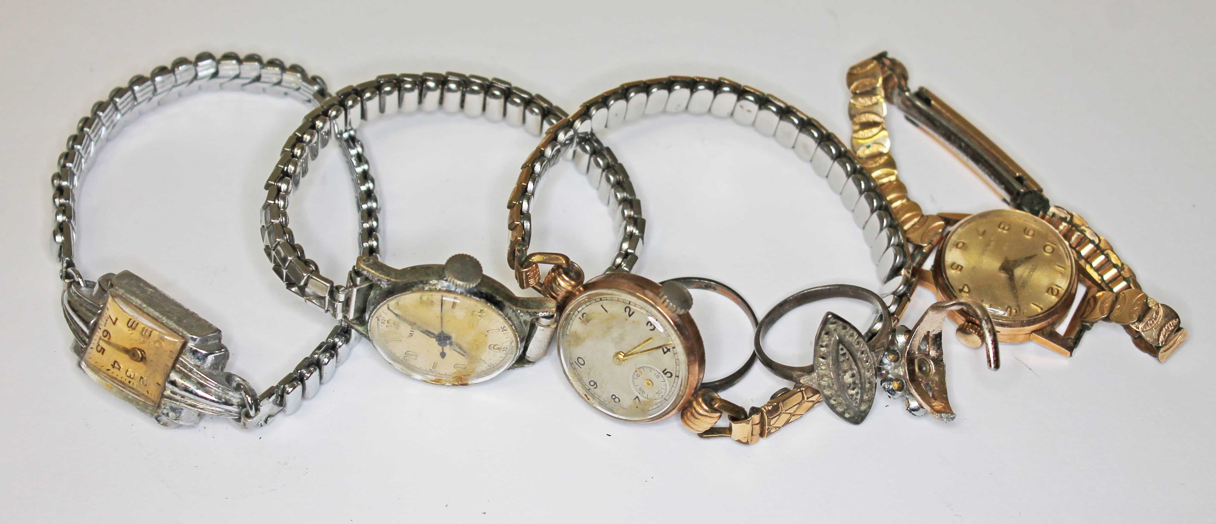 A ladies 9ct gold wrist watch and other assorted watches.