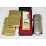 Four vintage cigarette lighters including Sunex Camel, Zippo, Marlboro etc