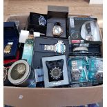 A box containing a large quantity of ladies and gents wristwatches.