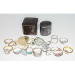 Assorted costume rings and two antique ring boxes.