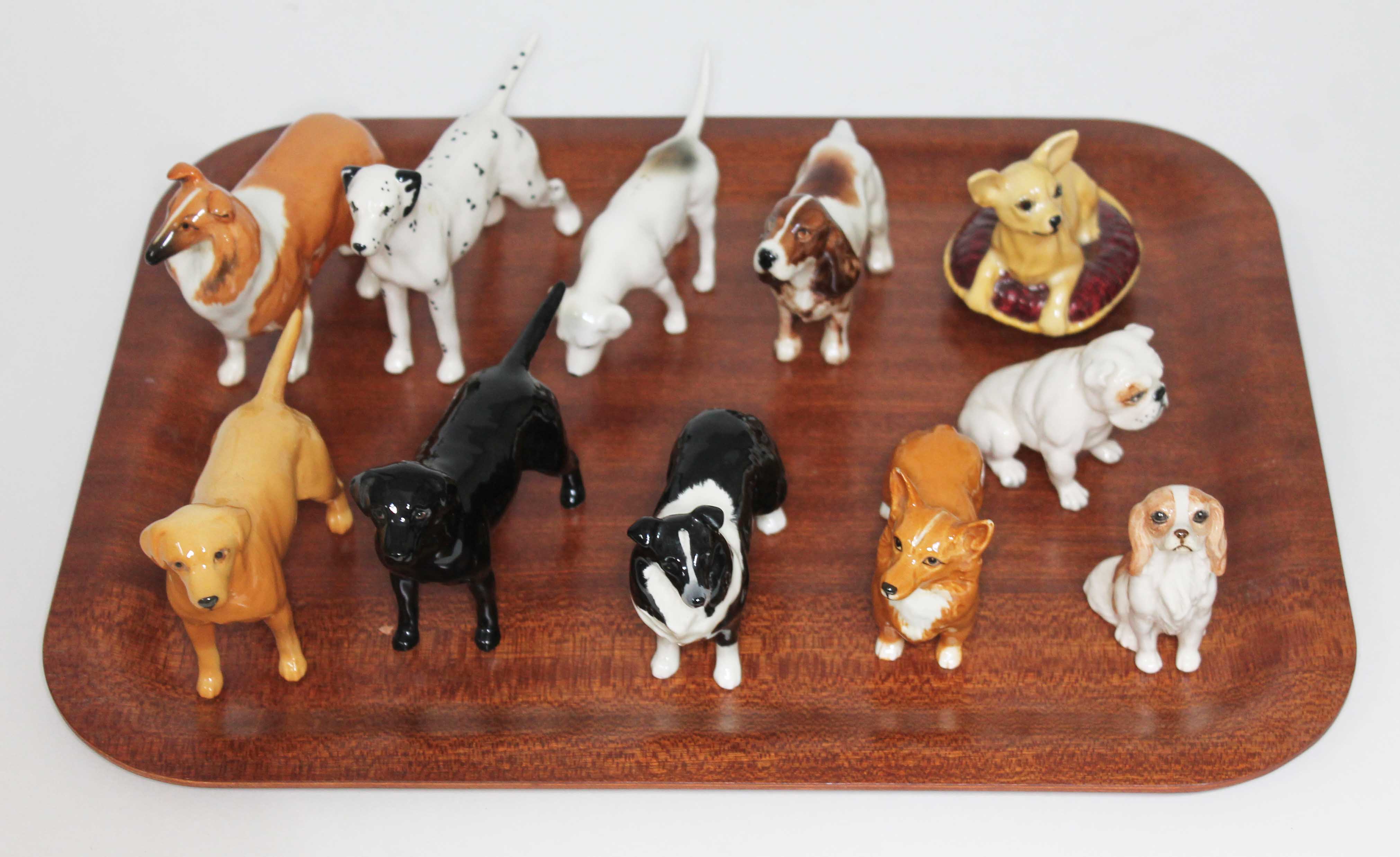 Eleven Beswick dogs.