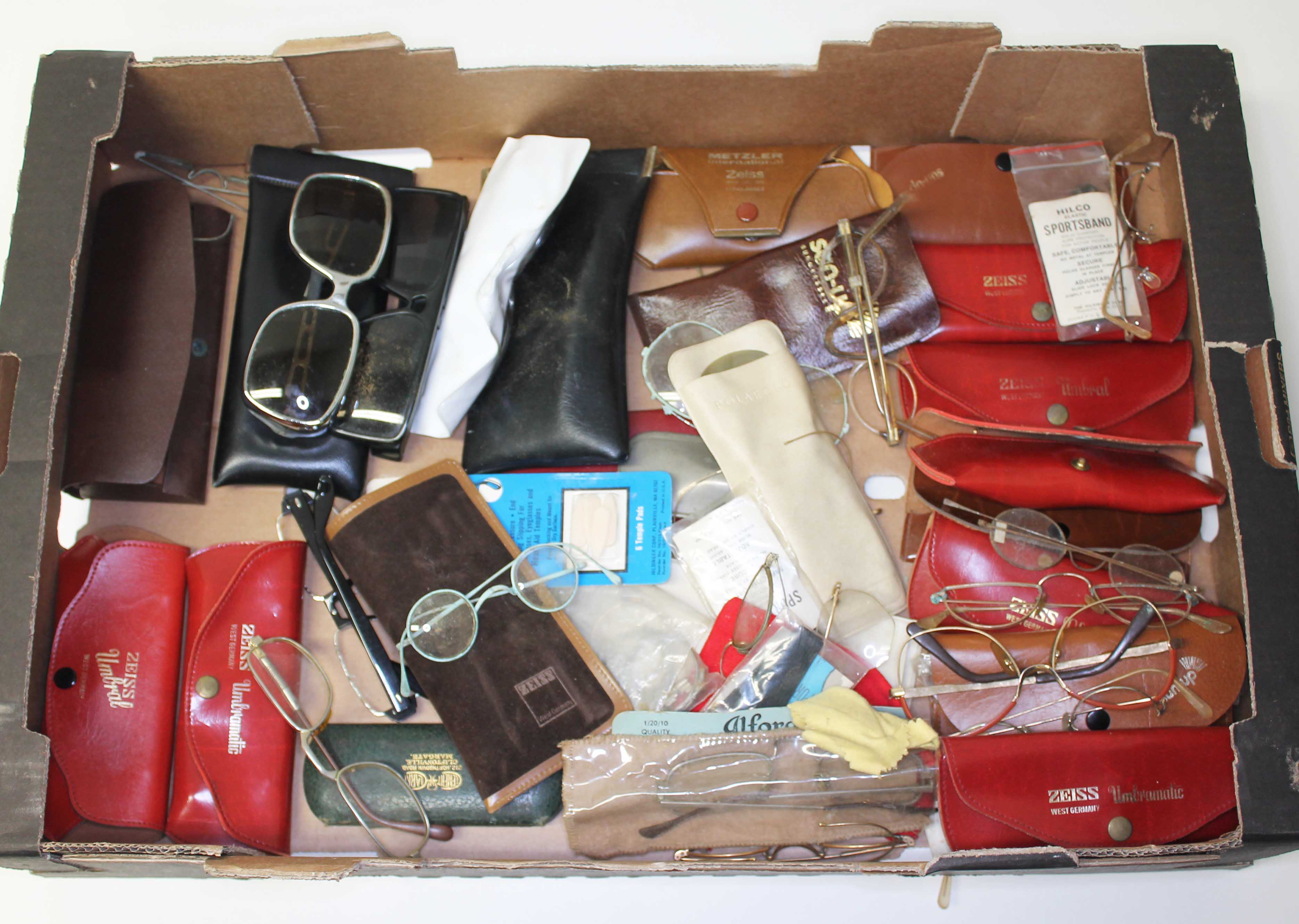 A box of vintage spectacles and sunglass.