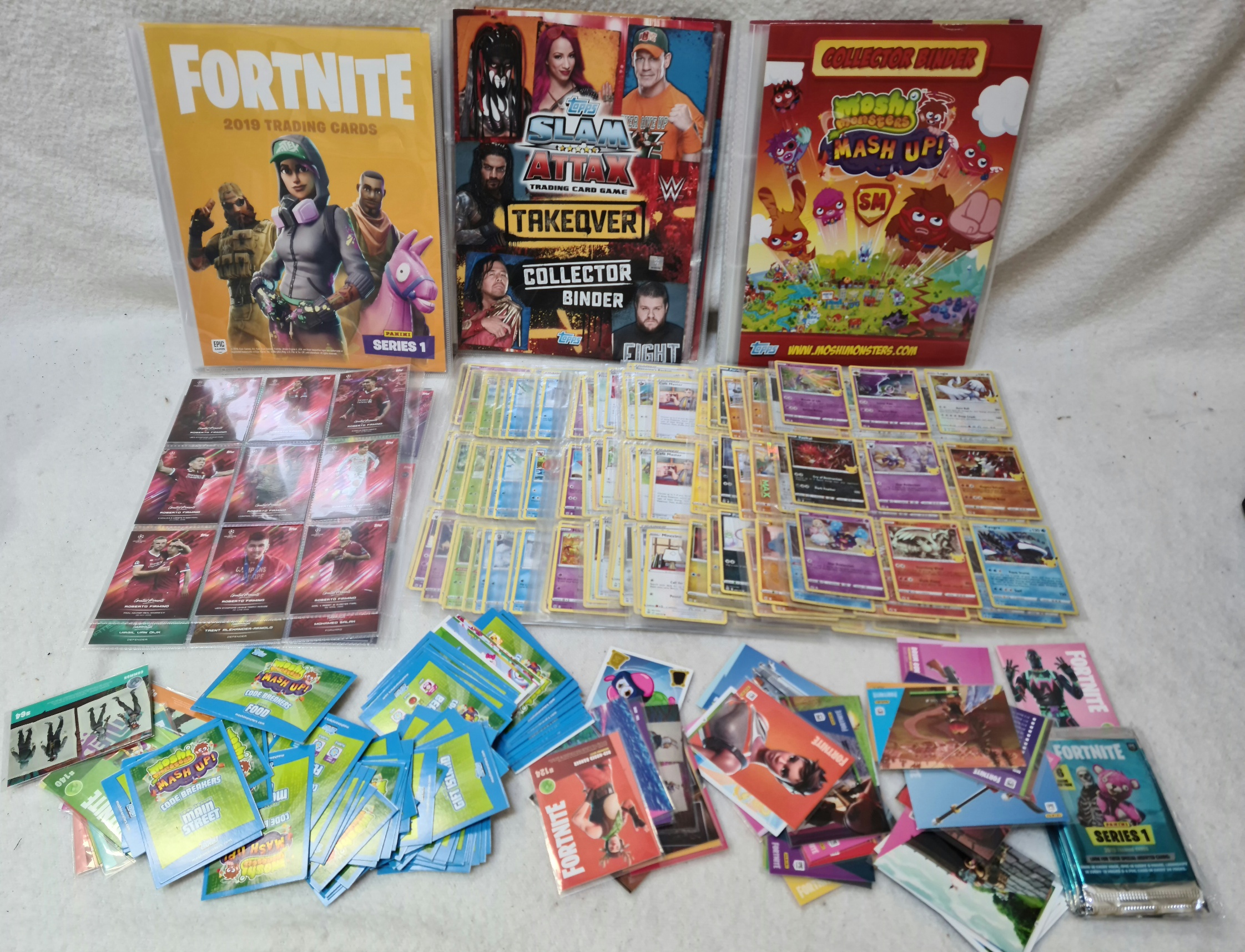 A box of collectable cards to include approx 280 Pokemon, Fortnite, Slam Attax, Moshi Monsters and