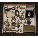A mixed lot including a lorgnette, a whistle, a fob medal marked 'Sterling', military badges etc.