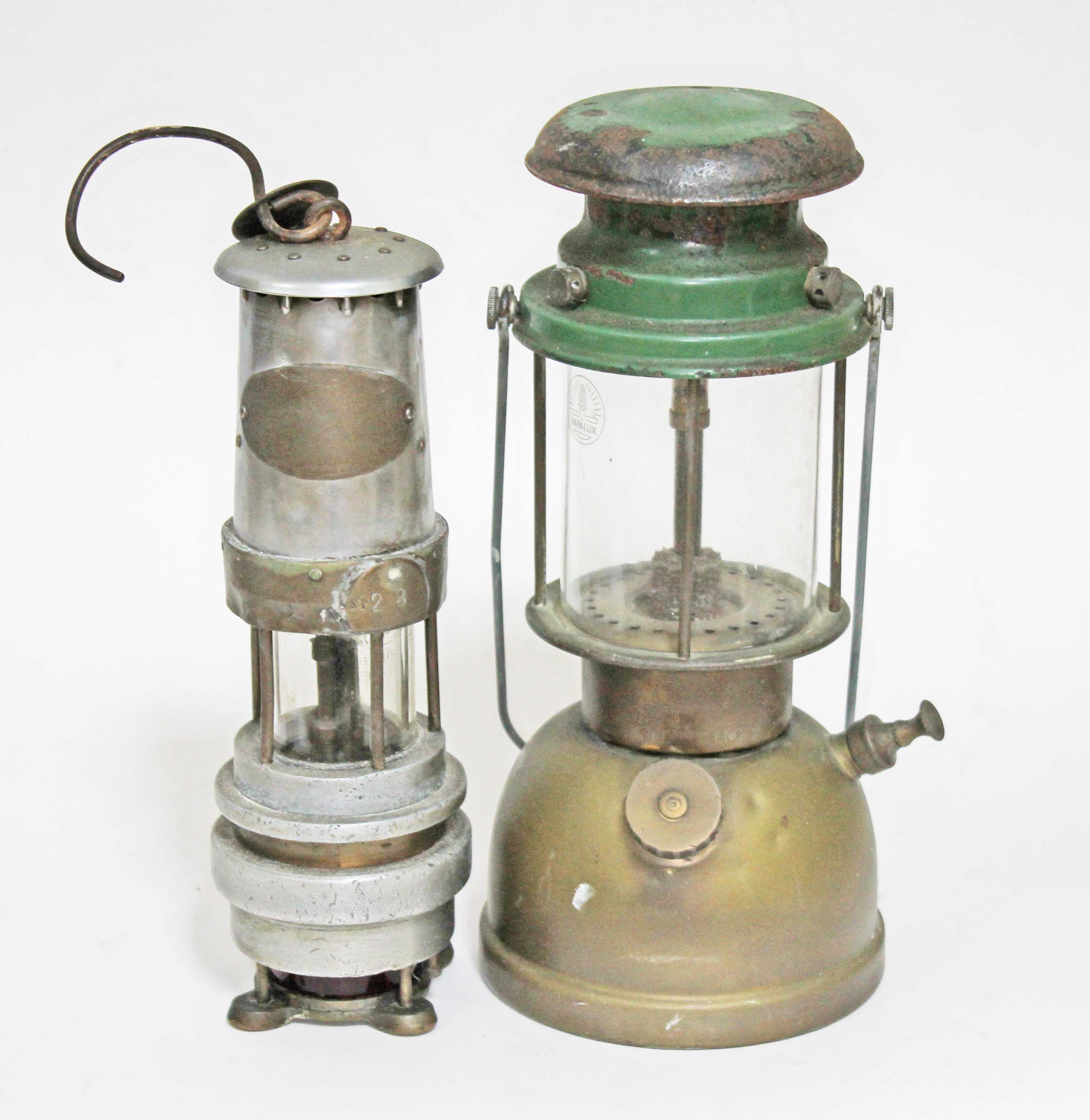 A miner's lamp and a paraffin lamp.