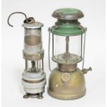 A miner's lamp and a paraffin lamp.