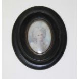 A miniature portrait on ivory, oval frame 11cm x 9cm.