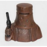 A cast metal money bank Ned Kelly marked 'NSW 1956'.