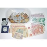Assorted coins and bank notes.