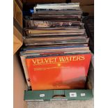 A box of 100+LP records, various artists.