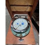 A vintage portable air pressure monitor