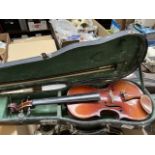 An antique violin, two piece back length 310mm, with bow and hard case.