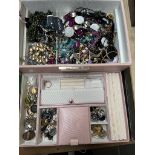 A box of assorted costume jewellery.