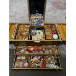 A jewellery case with a collection of costume jewellery