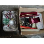 A box and a tin of costume jewellery