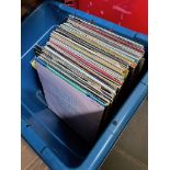 A box of various records