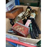 A box of assorted items including a cast metal money bank.