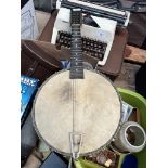 An old 8 string mandolin banjo.