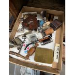 A tray of collectables and a box of vintage postcards and photographs, Edwardian period onwards