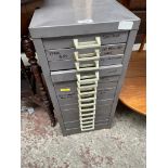 A Stor 14 drawer metal cabinet.