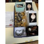 A tray of costume jewellery and watches including boxed watches by New Look and Mantaray