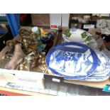 Two boxes of assorted items comprising blue and white plates, brass ware, a Japanese Arita charger