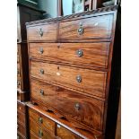 A 19th century inlaid mahogany chest of drawers.