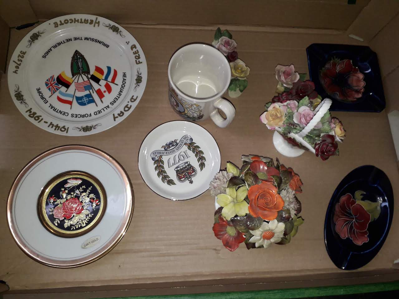 A mixed lot comprising two Moorcroft pottery dishes, china posies etc.