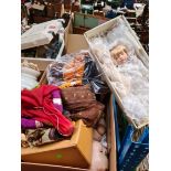 A large box of dolls and various toys to include bisque, teddy bear, etc.