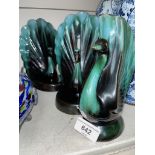 A pair of terracotta bookends in the form of peacocks, by Blue Mountain Pottery Ltd Canada, together