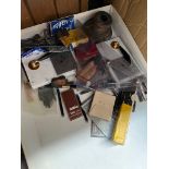 A box of pen items, stands, etc.