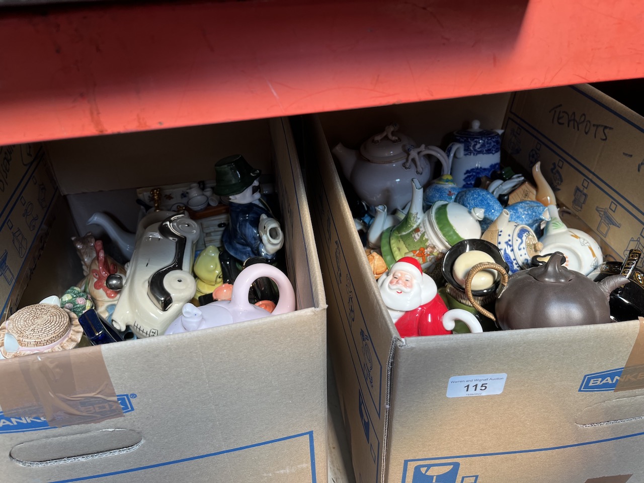 2 boxes of novelty teapots.